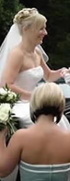 English toastmaster assisting a bride from a horse drawn carraige